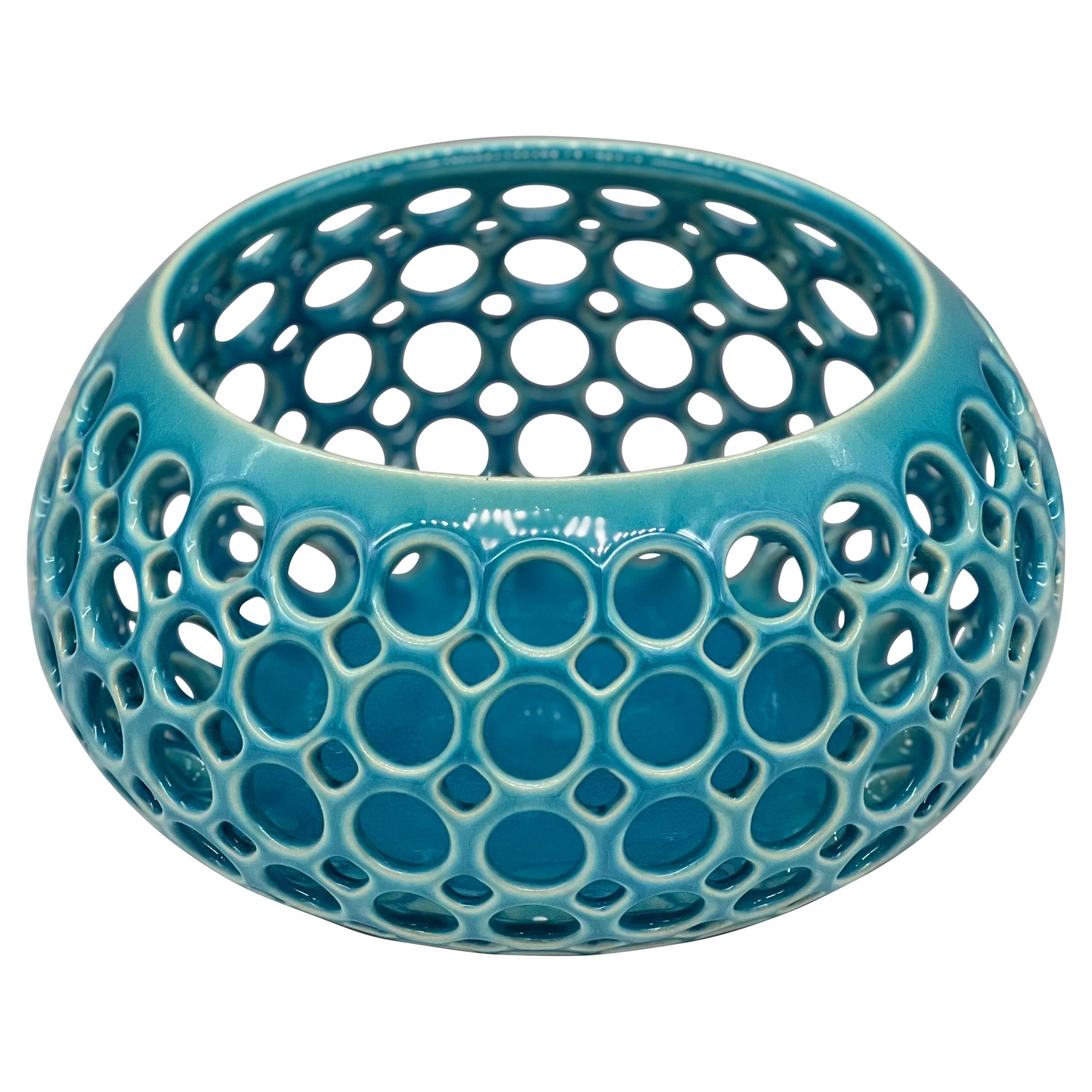 Small Turquoise Pierced Wide Teardrop Shaped Tabletop Sculpture or Candleholder For Sale