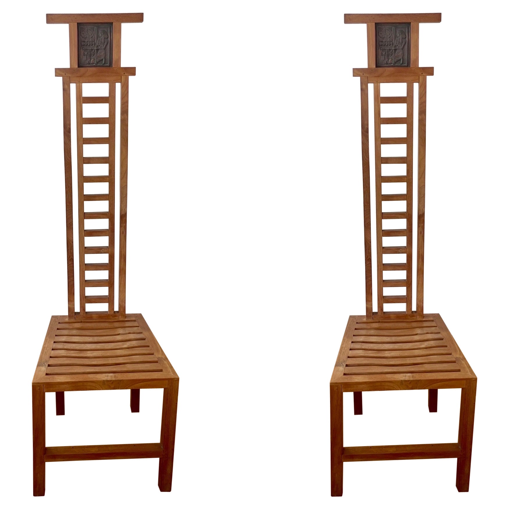 Pair of Solid Teak Tall Back Rare Chairs with Egyptian Motif