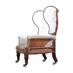 Antiker englischer Sessel mit geflügelter Rückenlehne aus Eisen aus dem frühen 19. Jahrhundert, um 1820