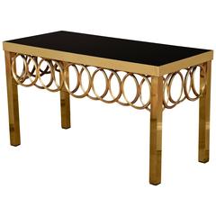 Brass Low Table with a Black Glass Top and Circular Overlapping Elements