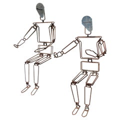 Pareja de Figuras Articuladas de Metal