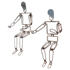 Pair of Articulated Metal Figures