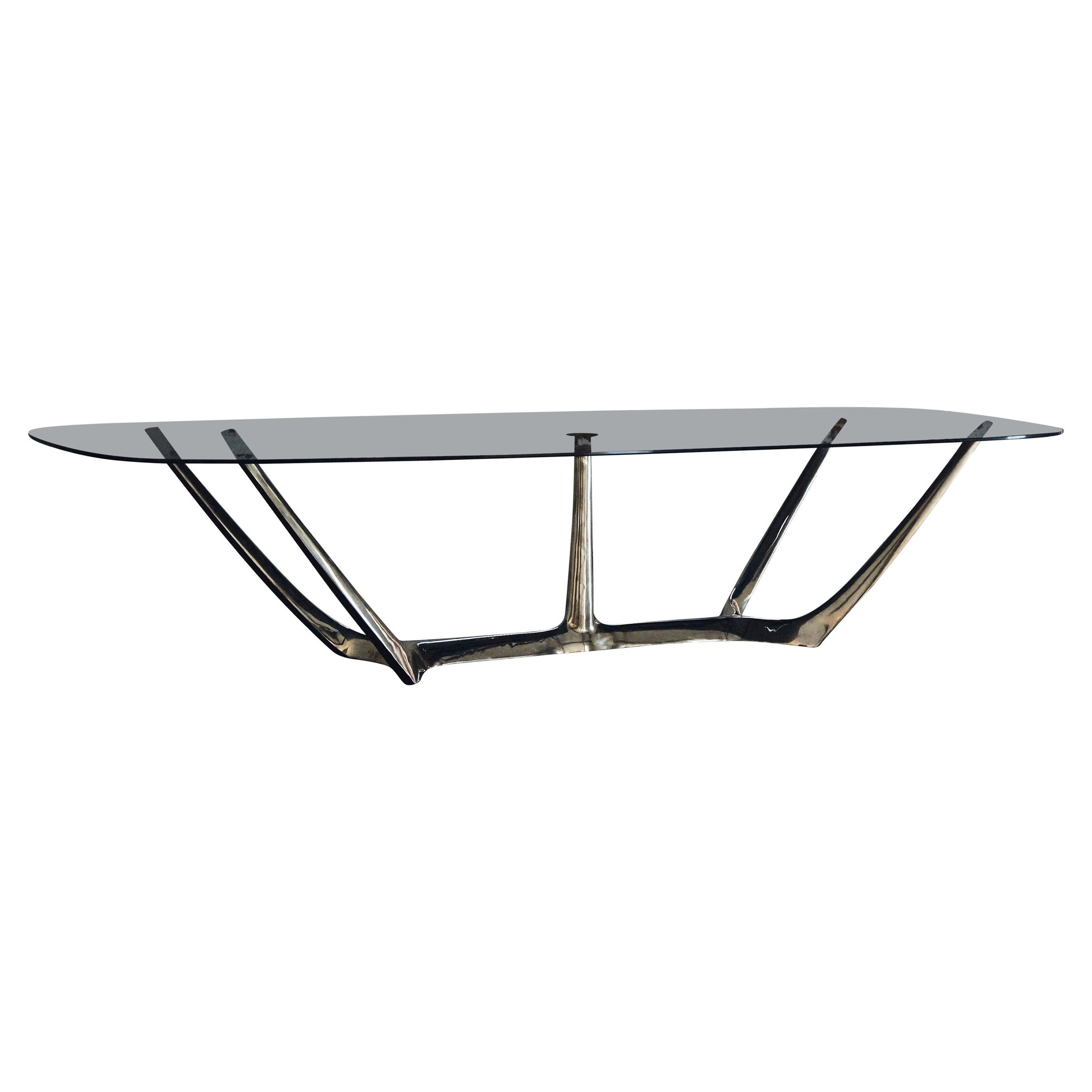 Tavolo "The Great Dining", base moderna in bronzo massiccio con piano in vetro grigio