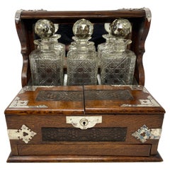 Antique English Oak Games Box 3-Bottle Tantalus with Cordials, circa 1880