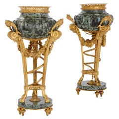 Two Gilt Bronze Mounted Verde Antico Marble Urns after Gouthière