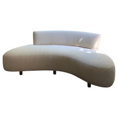 Curved Serpentine-Inspired Sofa in Creamy Boucle