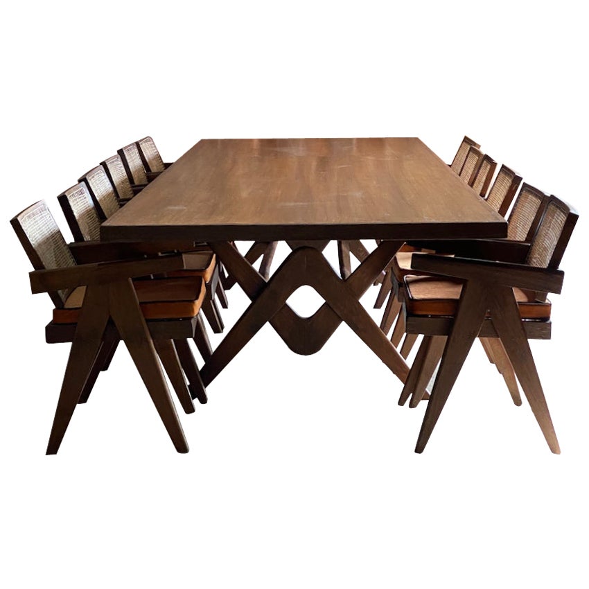 Pierre Jeanneret dining table & twelve chairs teak Chandigarh Circa 1963-1964

Pierre Jeanneret Model: PJ020112 teak rectangular dining table (Table En Teck) known as 