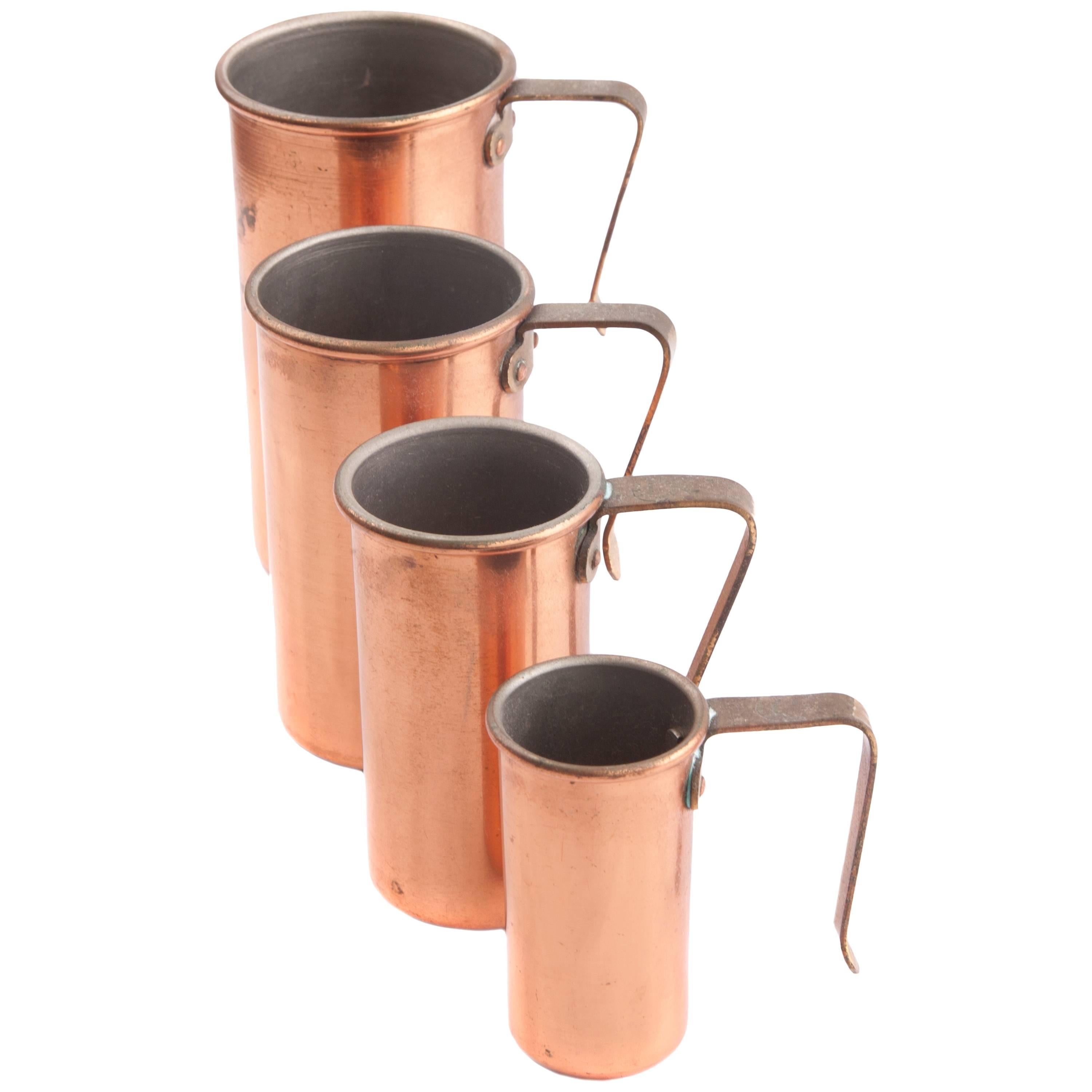 vintage copper measuring cups, set graduated measures or bar