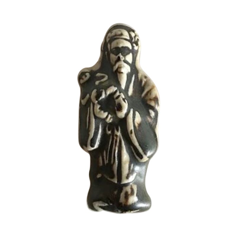 Royal Copenhagen Stoneware Relief Figurine of Japanese Monk with Child For Sale