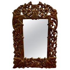 Antique Heavily Carved Fruitwood Mirror