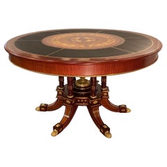 Gilt Mounted and Marquetry Inlaid Leather Topped Center Table