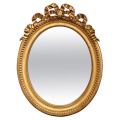 Mid-Century French Louis XVI Carved Giltwood Oval Wall Mirror