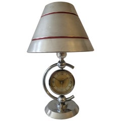 Vintage German Art Deco Chrome Mechanical Alarm Clock/Lamp with Aluminum Banded Shade.
