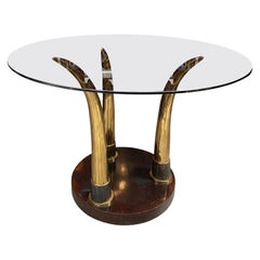 Table ronde française de style éléphant en verre fumé et laiton, base en placage d'acajou