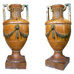 19th Century French Pair of Glazed Ceramic Vases with Handles and Garlands