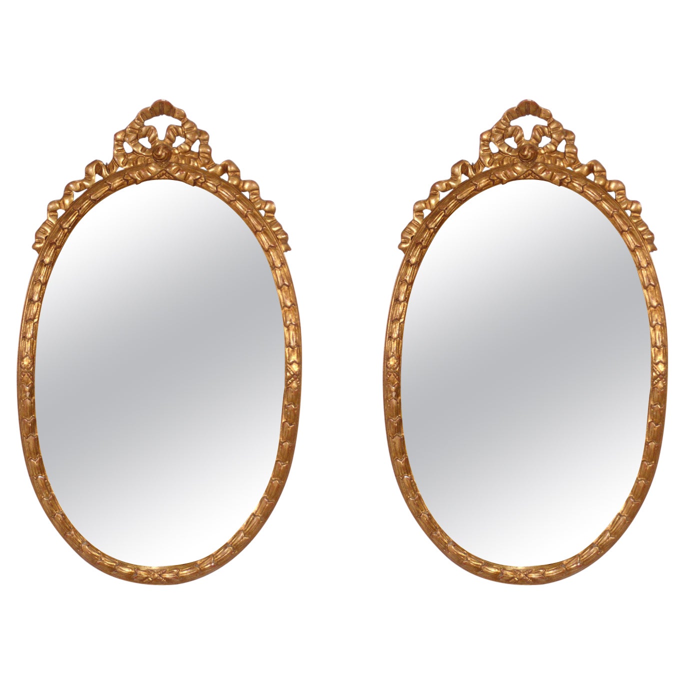 Paire de miroirs italiens ovales dorés de style rococo de l'hôtel Carlyle NYC