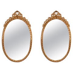 Pair of Gilt Rococo Style Oval Italian Mirrors from The Carlyle Hotel NYC