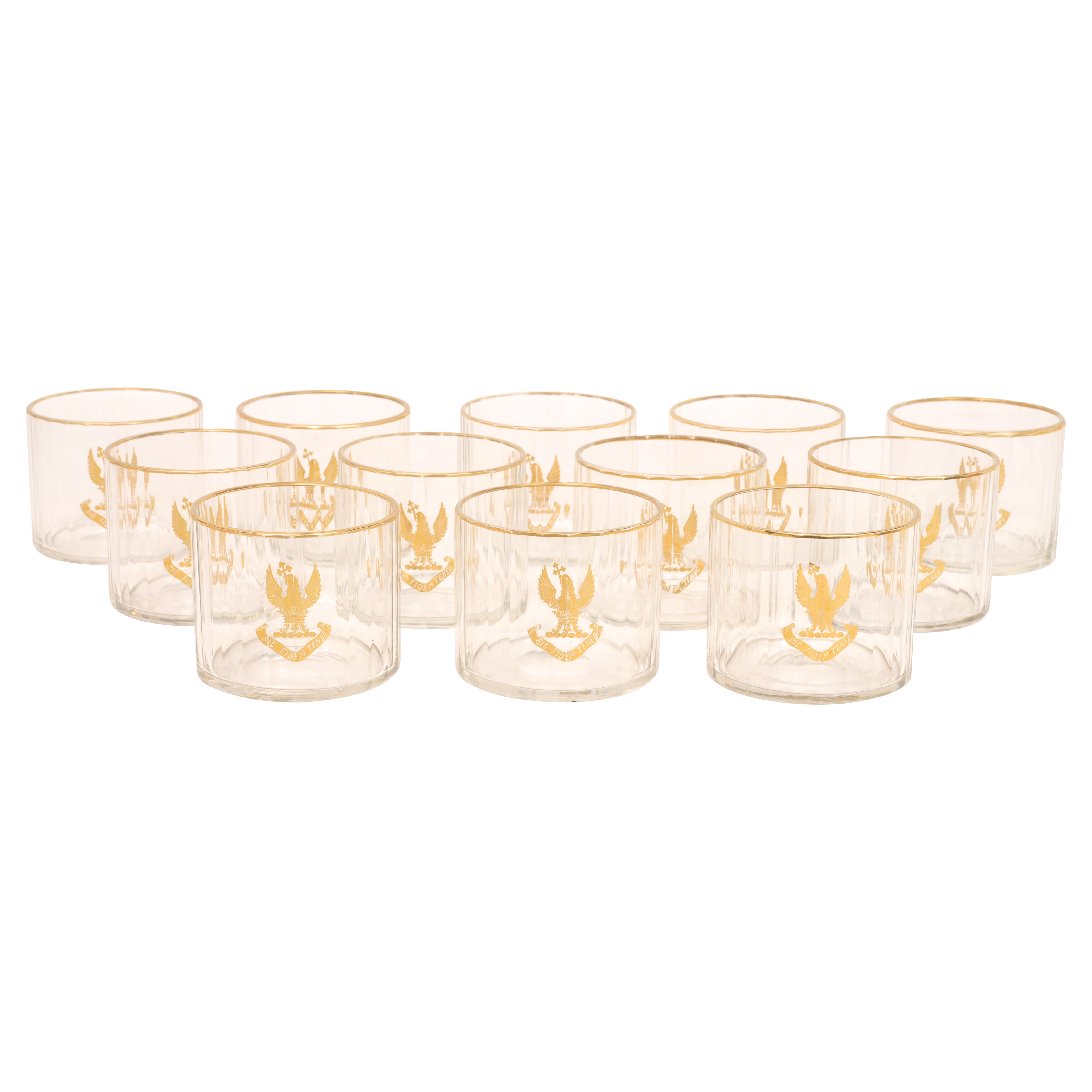 Set of 12 Armorial Straight Facet-Cut 24 Panel Gilt Decorated Crystal Glasses