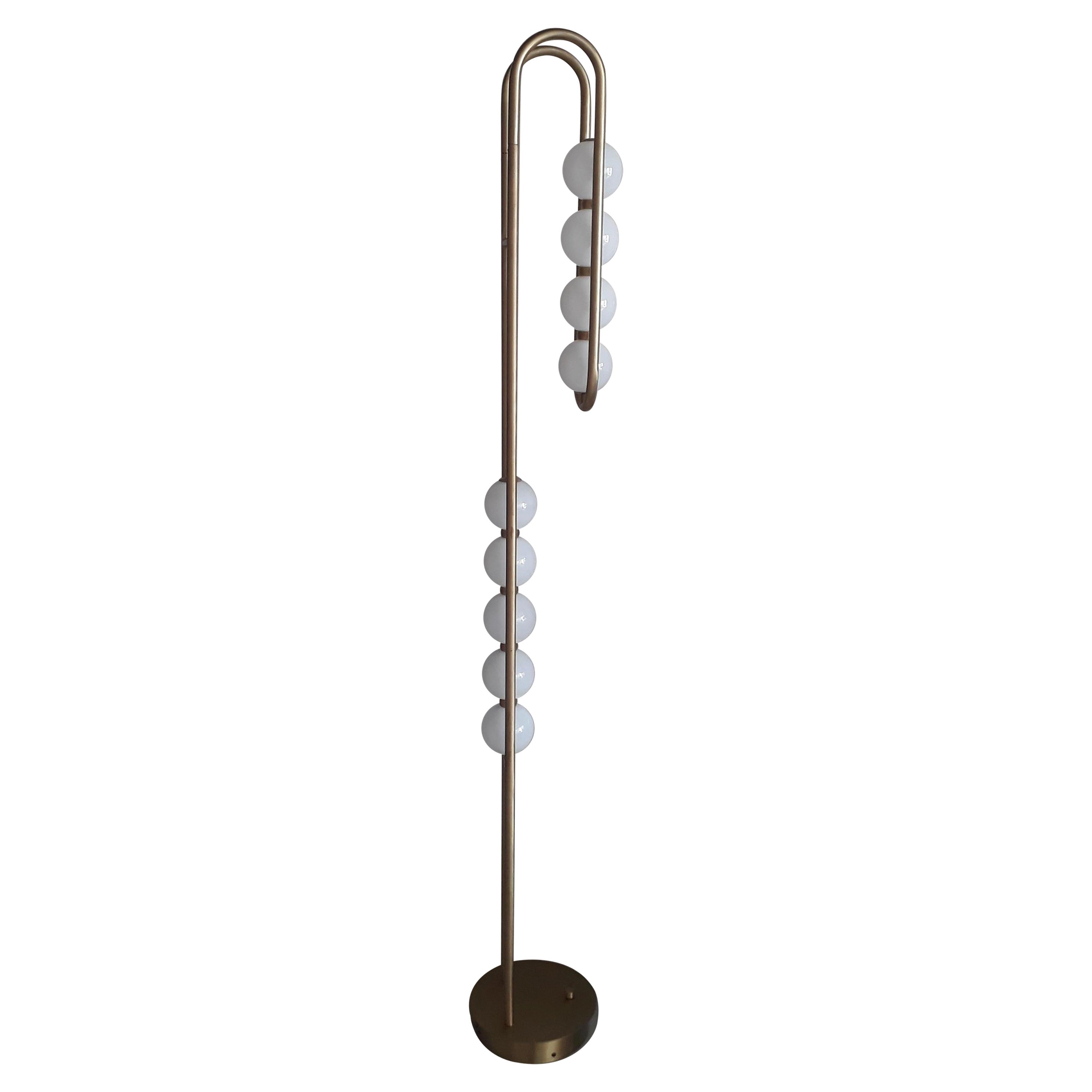 The J Standing Lamp with Integrated LED and Brass