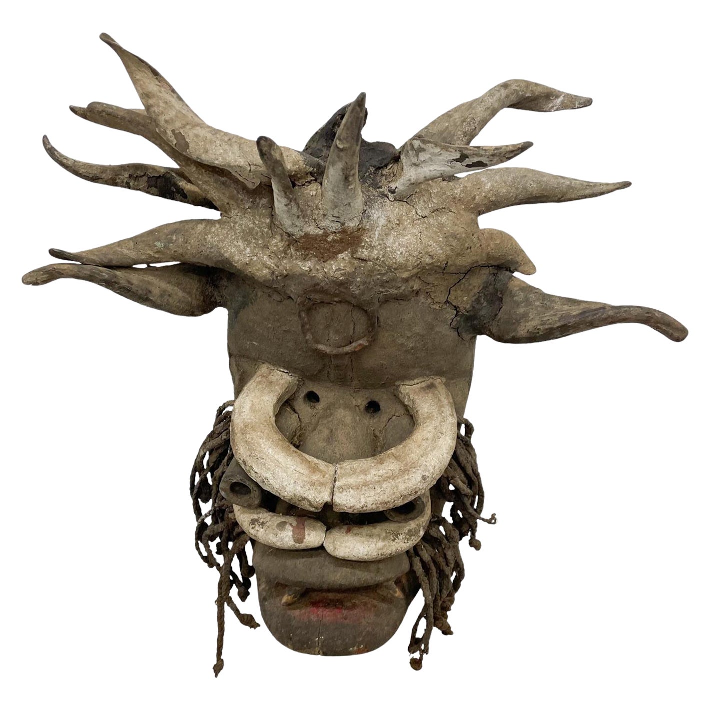 African Mask
Style of Powerful and Sacred African Dan mask Wall art decor Sculpture in wood
Measures: 15.75 width x 16 tall x 10.25 depth
Unattributed.
Preowned unrestored original vintage condition. Wood with vintage patina. 
Wear present.