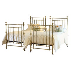 Matching Pair of Brass Antique Beds MP50