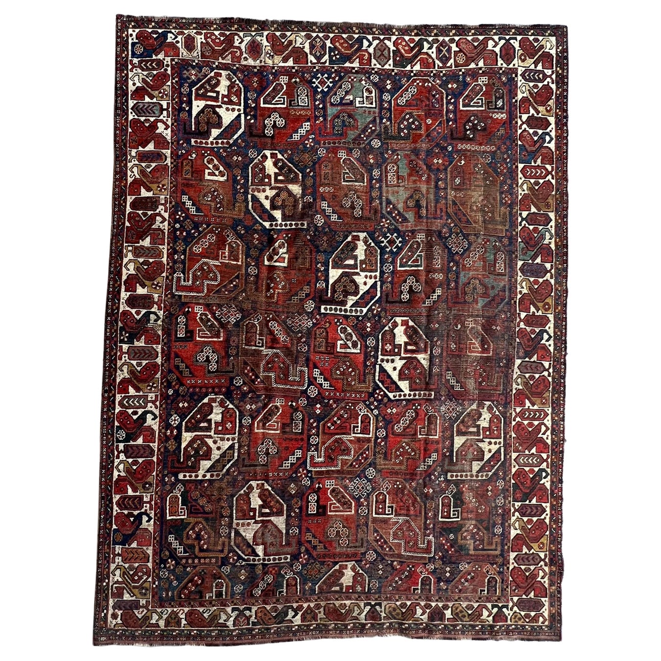 Antique Persian Tribal Shiraz Rug with a Repeating All over Pattern