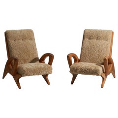 French Designer, Lounge Chairs or Arm Chairs Solid Oak, Shearling, France, 1950s