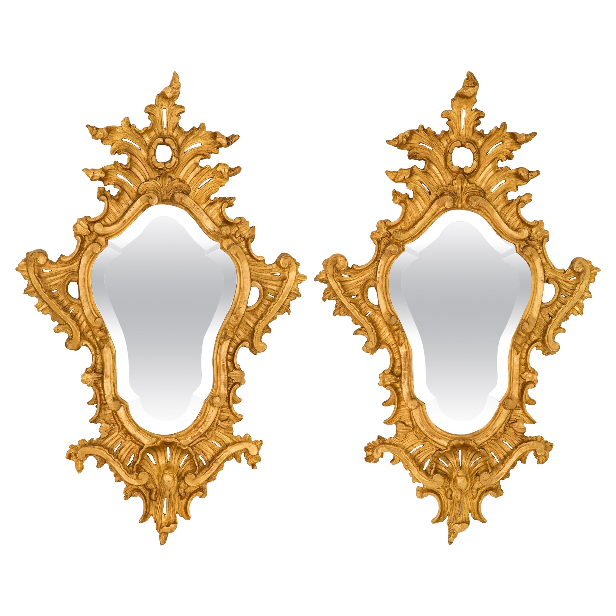 Pair of Italian 18th Century Baroque Period Giltwood Mirrors