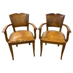 Pair of French Art Deco Leather Moustache Armchairs, 1930s