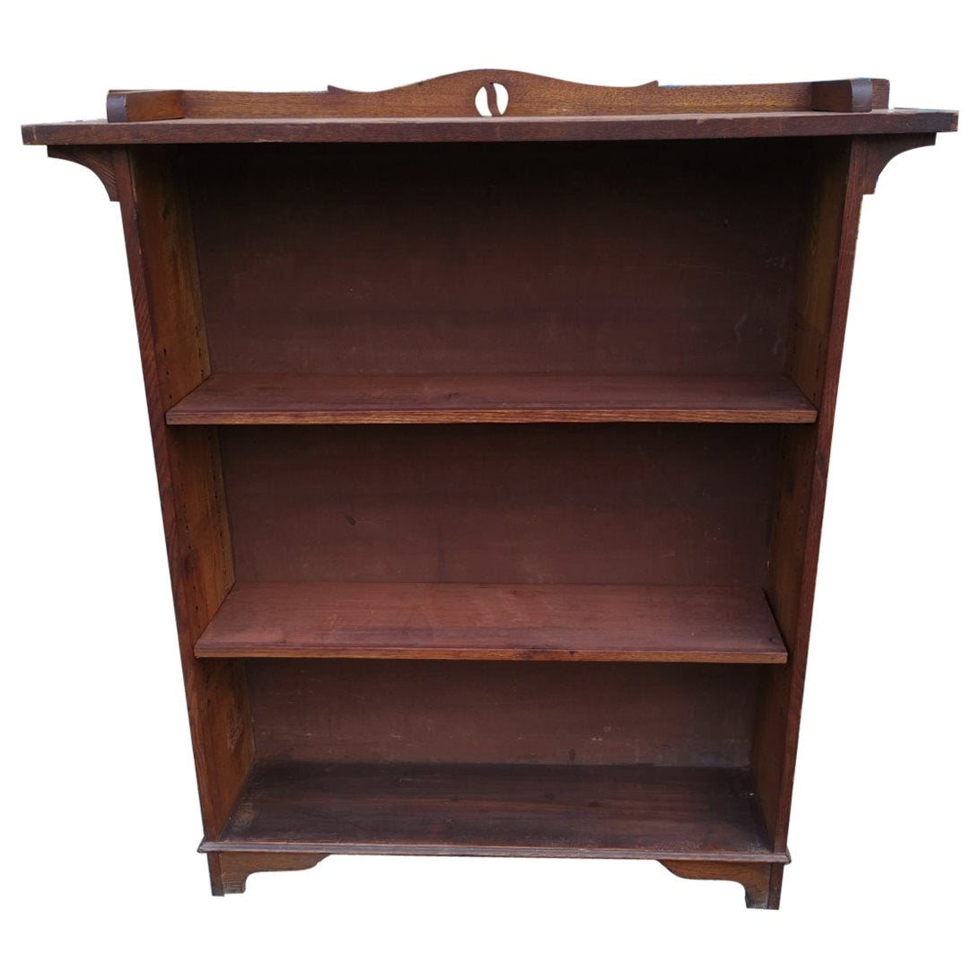 Arts & Crafts Oak Bookcase with Ying-Yang Detail to the Top & Adjustable Shelves For Sale