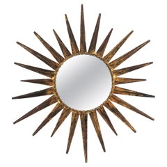 Miroir Sunburst dans le style de Gilbert Poillerat, fer forgé doré