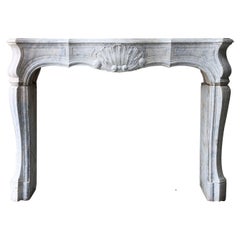 Louis XV Style Mantle Surround of Solid Marble from the 19th Century