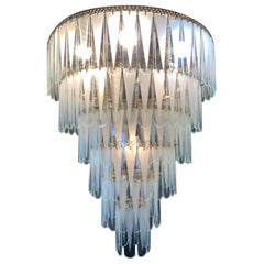 French Arte Deco Laminated Crystal Brass Waterfall Seven-Light Chandelier, 1950s