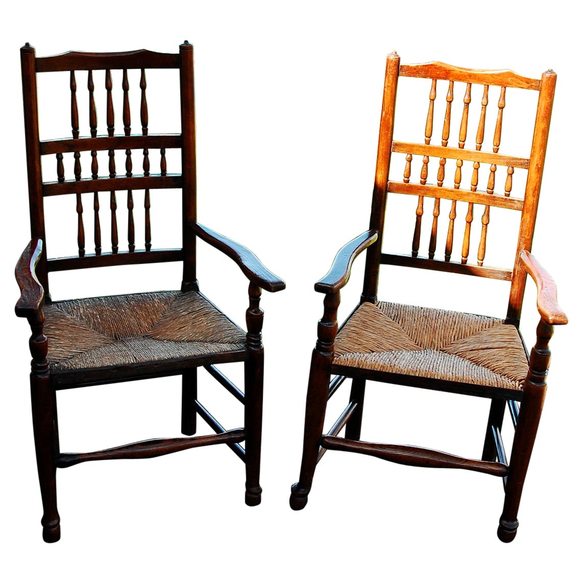 English Early 19th Century Matched Pair of Spindleback Armchairs in Elm For Sale