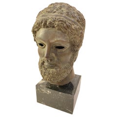 Bronze Head on Marble