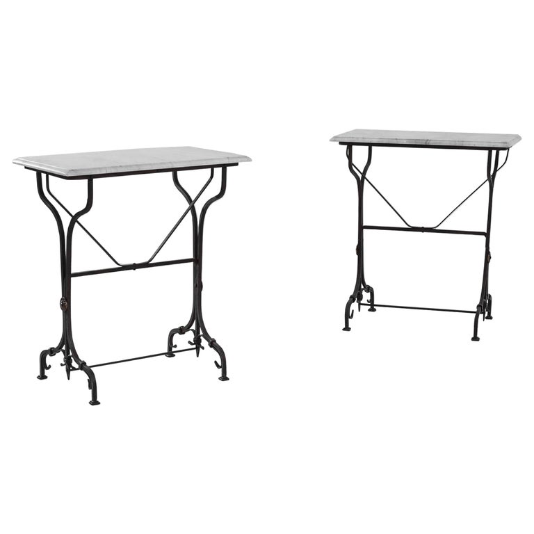 Pair of French wrought-iron console tables with marble tops, 1950s, offered by Collected by Schwung