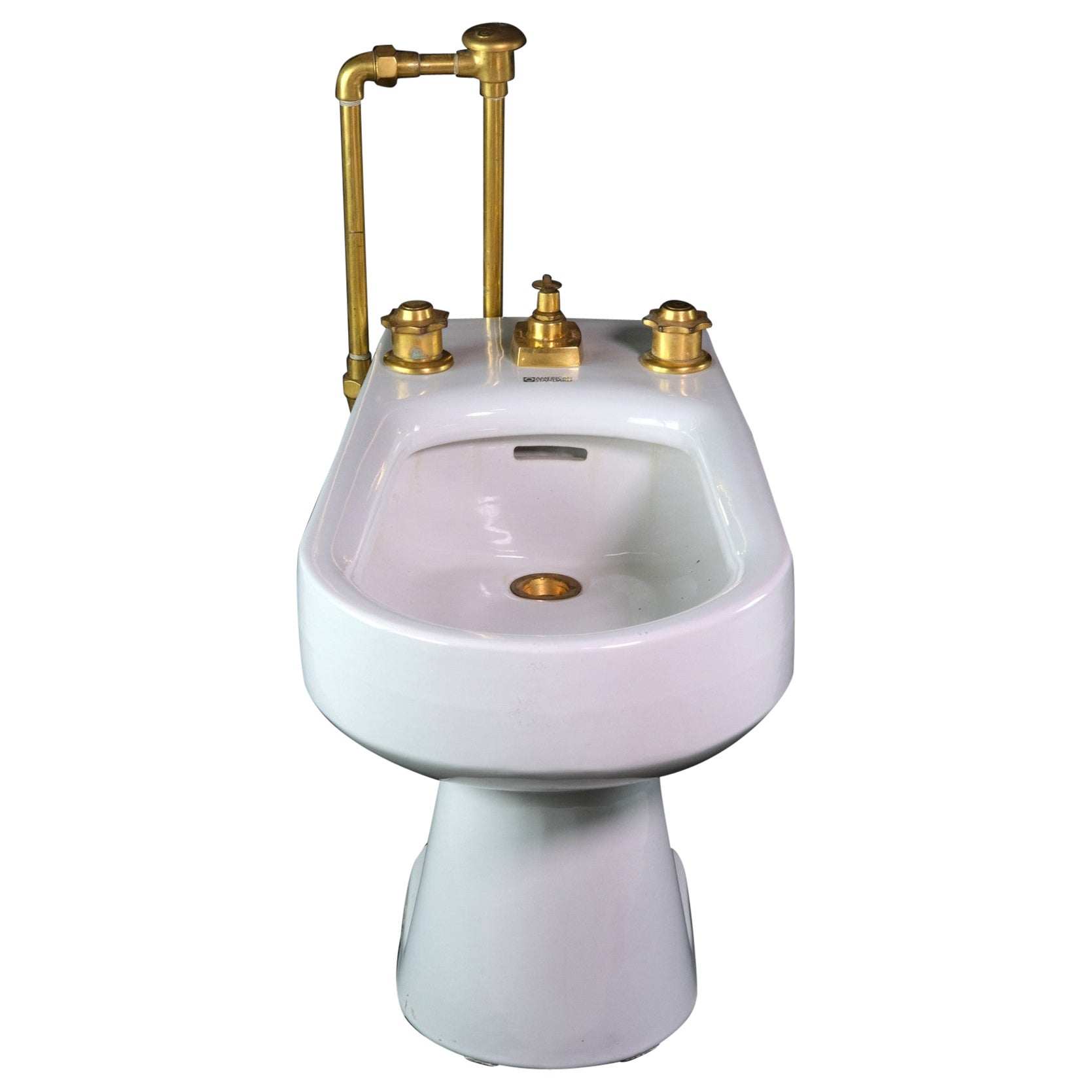 White Porcelain Bidet with Gold Plated Hardware by American Standard