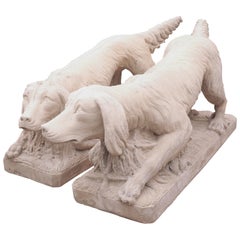 Pair of Cast Stone Dog Statues in a Light Sandstone Finish