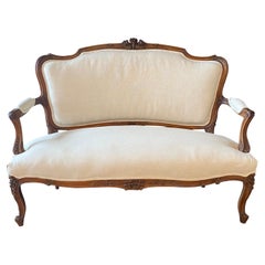 French Period Walnut Intricately Carved Louis XV Sofa or Loveseat