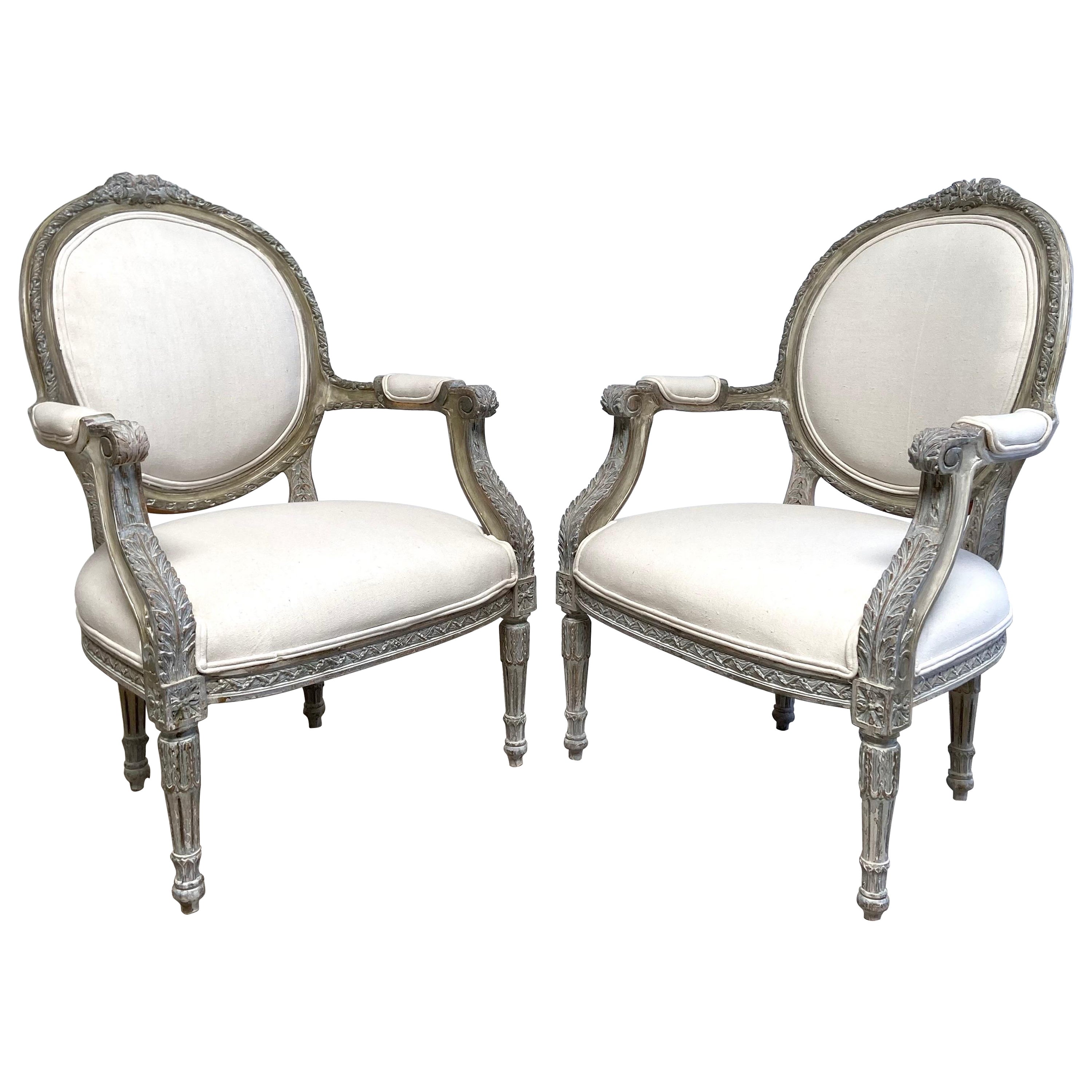 Pair of Vintage French Louis XVI Style Open Arm Chairs For Sale