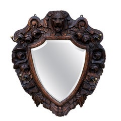 Used English Mirror Renaissance Revival Oak Frame Shield Shape Lion Wood Back