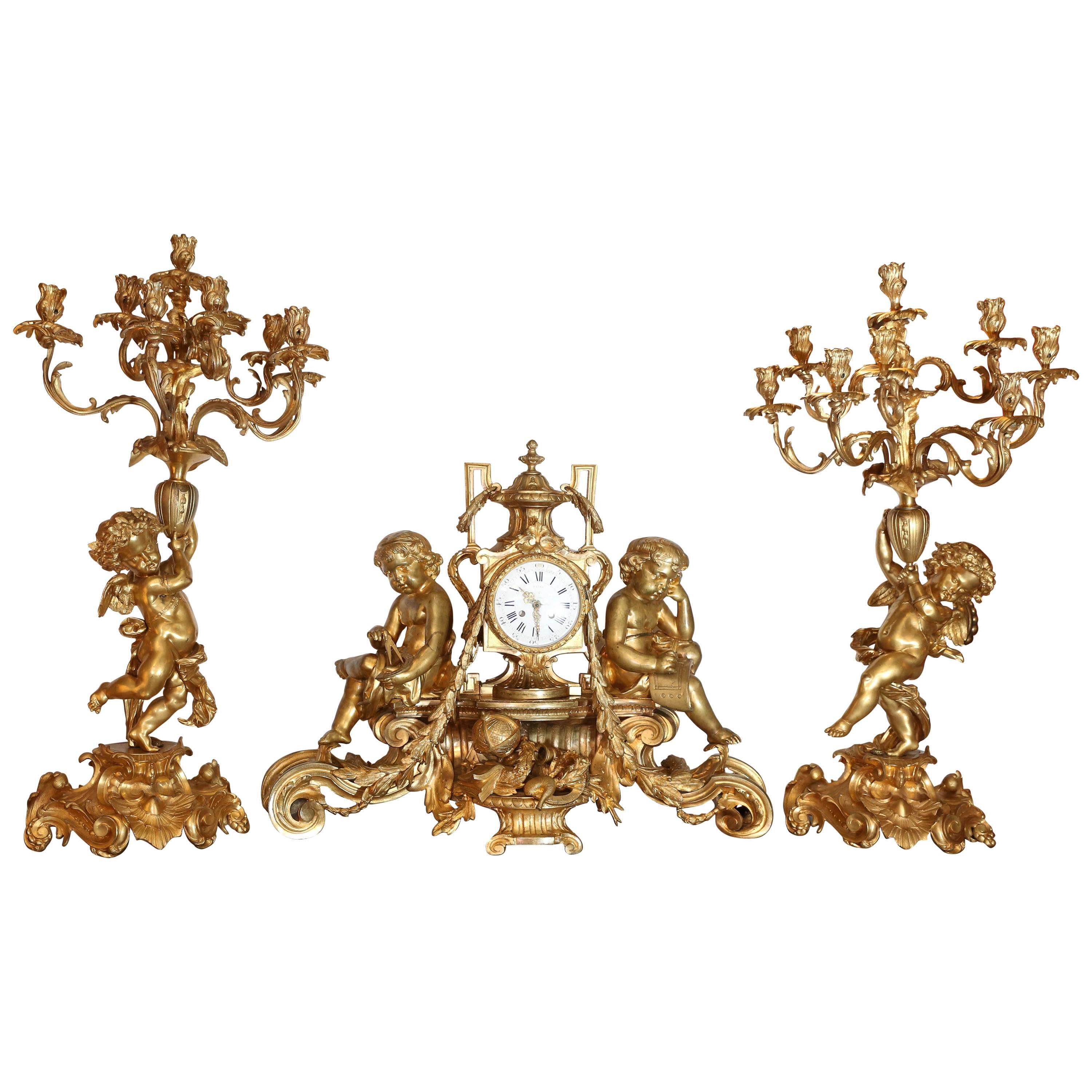Three-Piece French Garniture Set, 19th Century Consists of Clock and Candelabrum