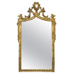 Miroir mural français de style Louis XIV en bois doré, XXe siècle