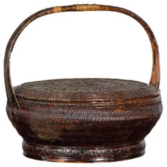 Cesta de ratán y bambú tejida a mano con asa, dinastía Qing, siglo XIX