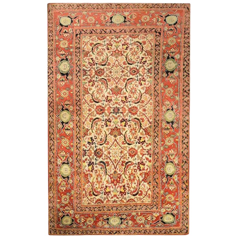 XIX Century, Agra Rug in Reds and Yellows on a Beige Background.