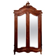 Antique French Carved Walnut Double Door Armoire with Beveled Mirrors Circa 1880
