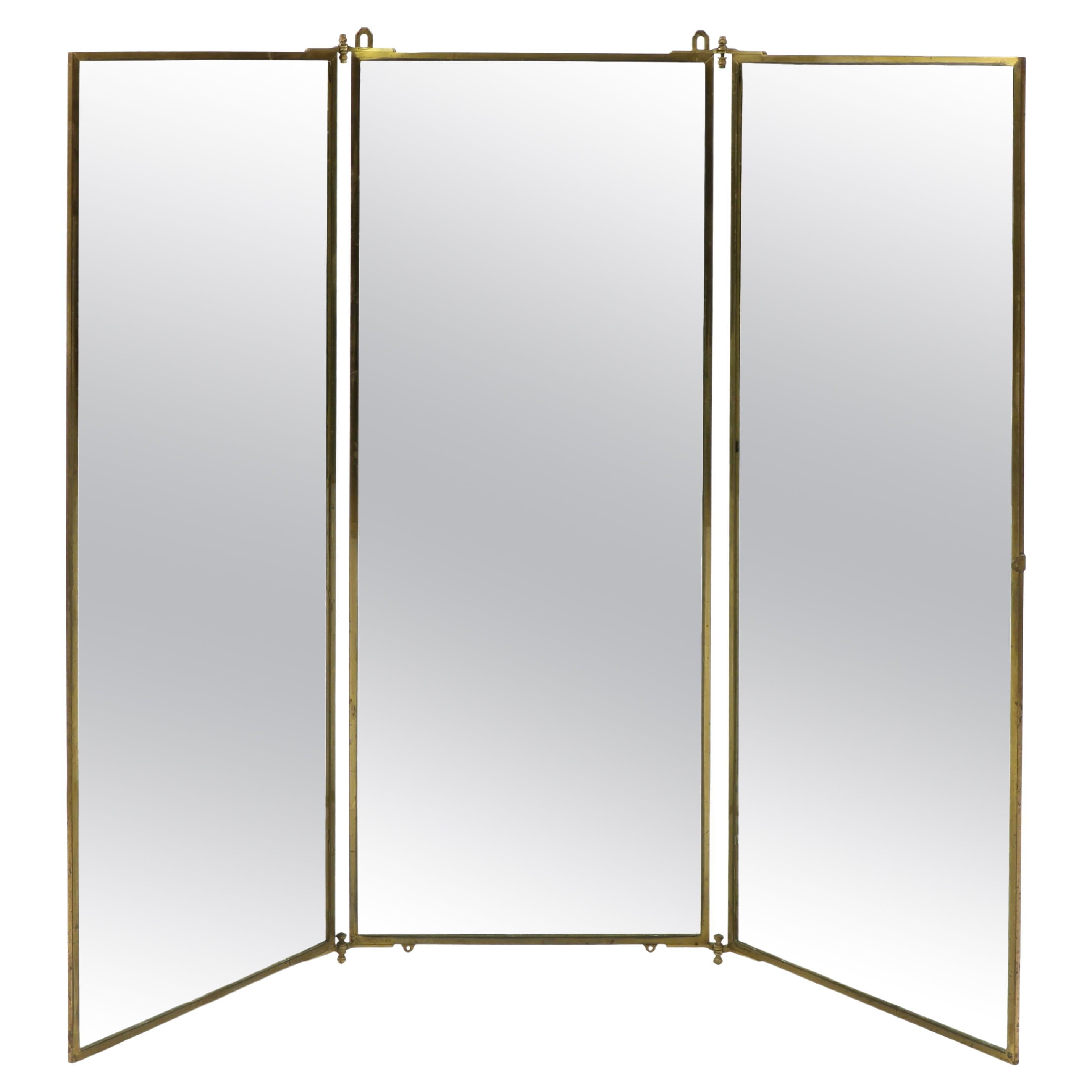 Tall standing brass triptych mirror by Maison Brot. YSL favourite !