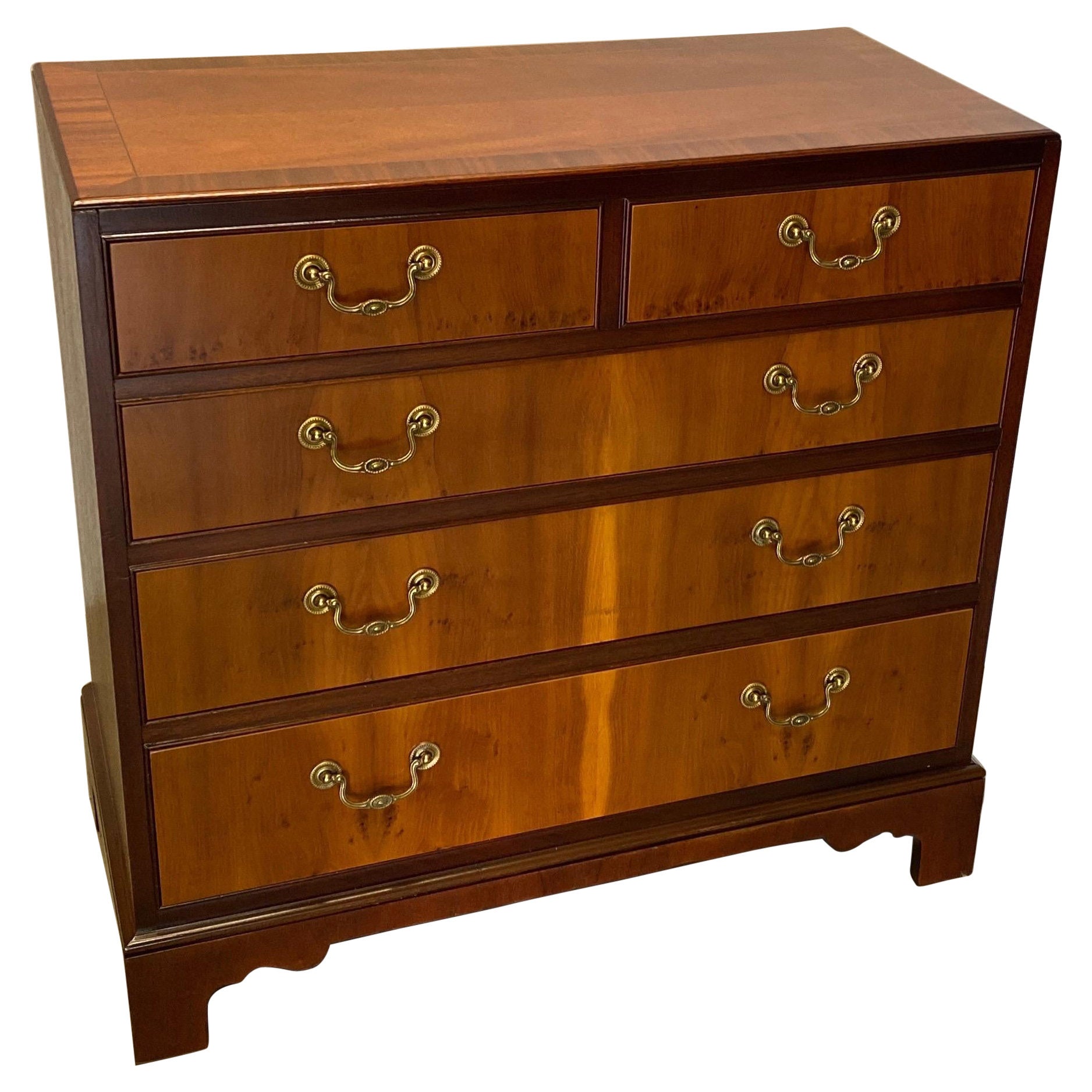 Mahogany and Yew Wood Bachelors Chest by Baker Furniture