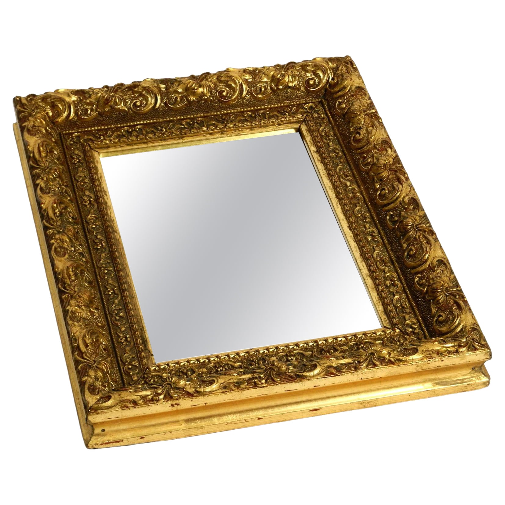 Beautiful Mid Century Wall Mirror from Italy with an Ornate, Gold-Plated Frame For Sale