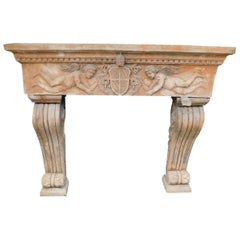 Antico caminetto in terracotta intagliato con cherubini, Italia, XX secolo